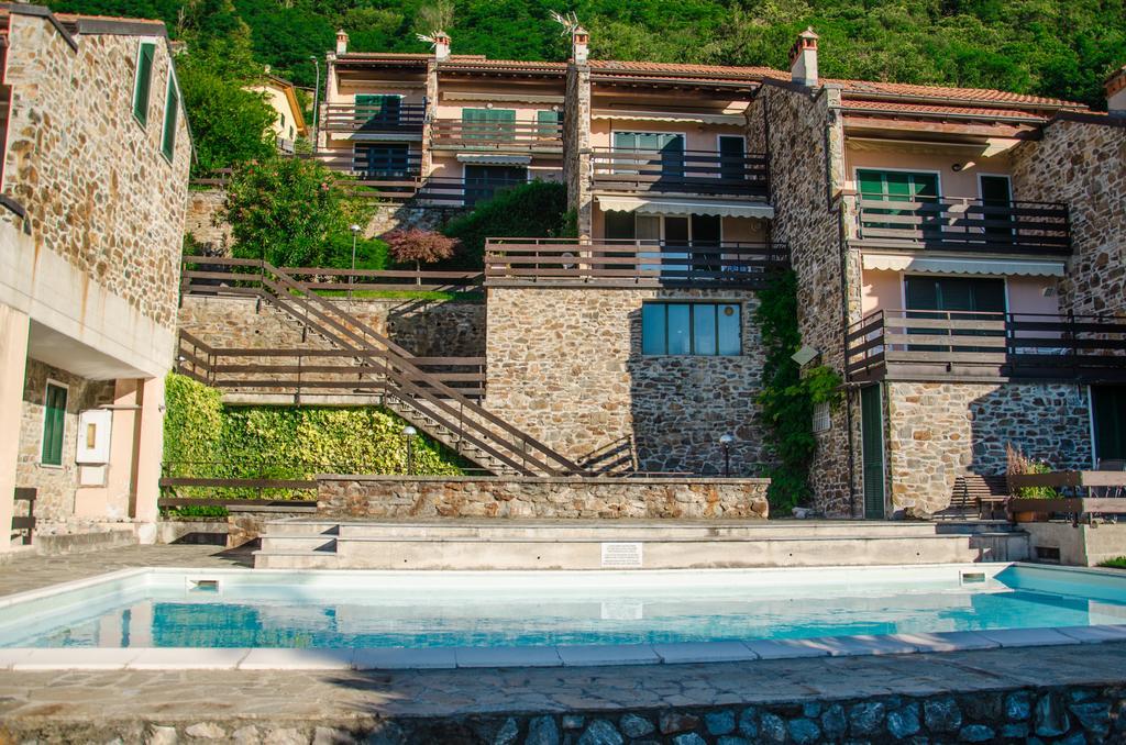 Anma Cottages Sole Lago Аккуазериа Экстерьер фото